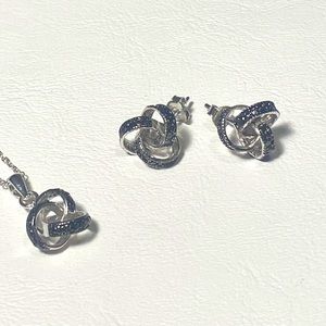 Dee Berkley earrings and pendant.